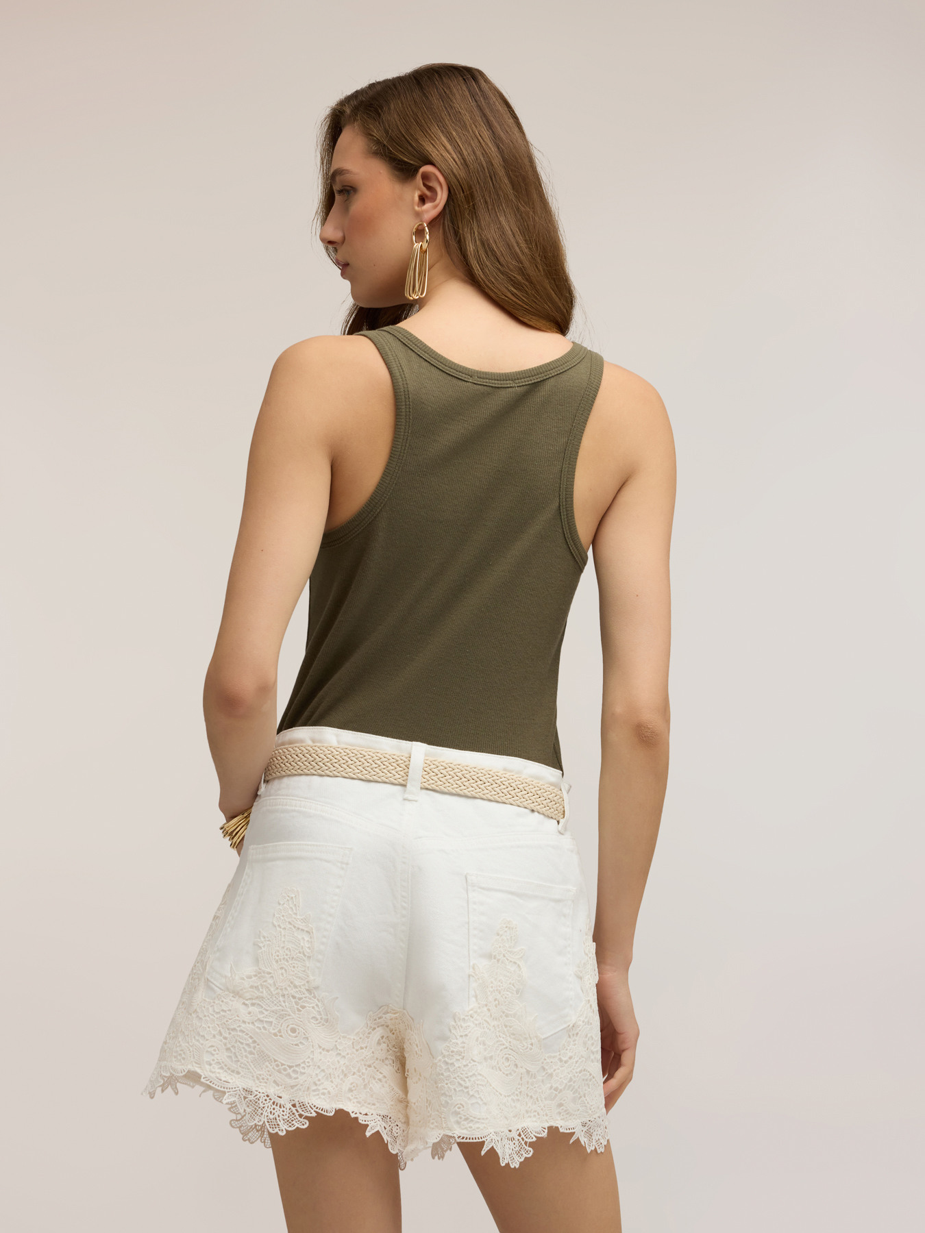 Top con applicazioni di pietre image number 1