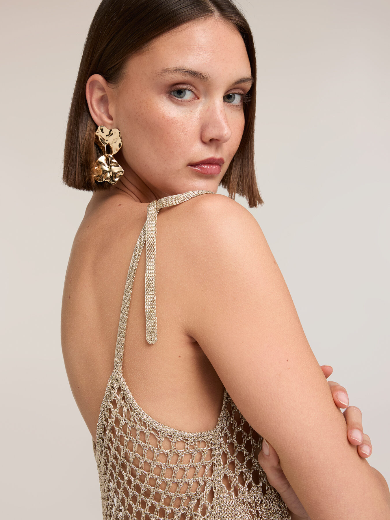 Top in maglia traforata in lurex image number 0