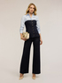Jeans palazzo con bottoni decorativi image number 0