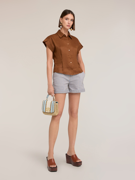 Camicia in lino con pieghe