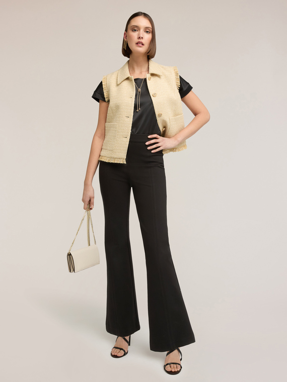 Pantaloni flare in punto milano