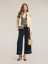 Pantaloni cropped con profili in contrasto image number 0