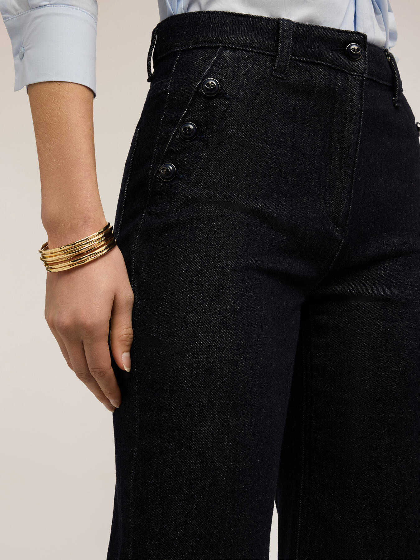 Jeans palazzo con bottoni decorativi image number 3