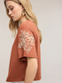 T-shirt in jersey con ricami floreali image number 0