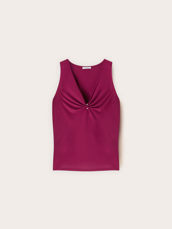 Top con scollo a V drappeggiato e piercing