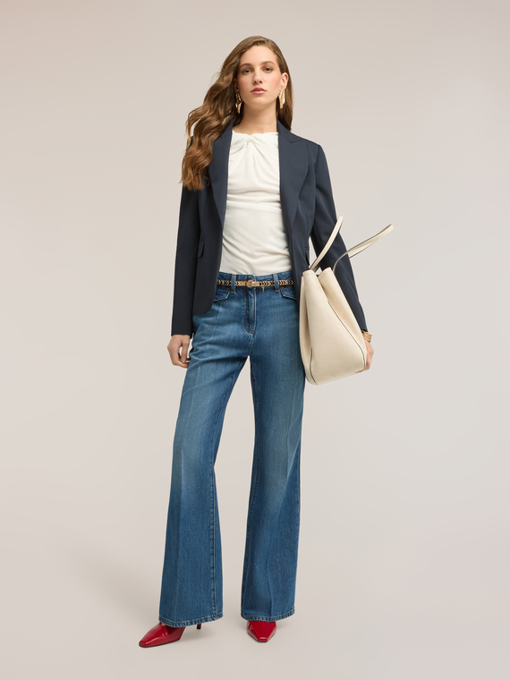 Jeans flare con tasche
