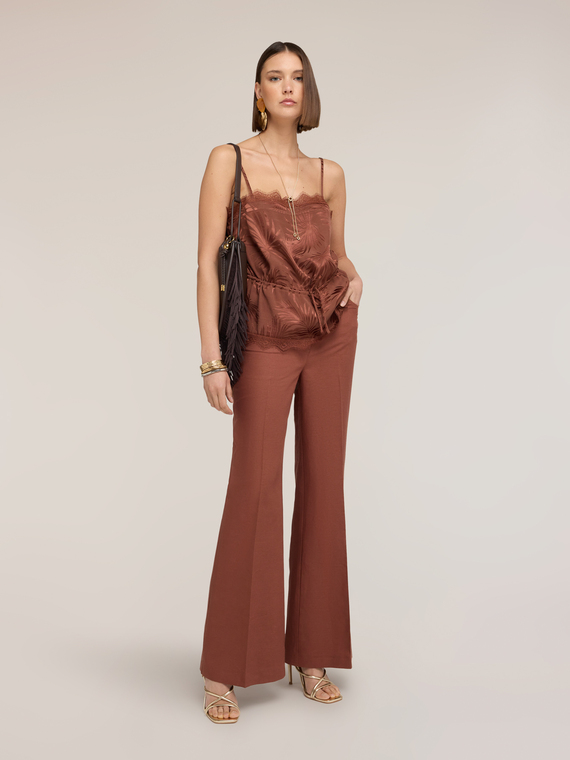 Top in raso jacquard con pizzo