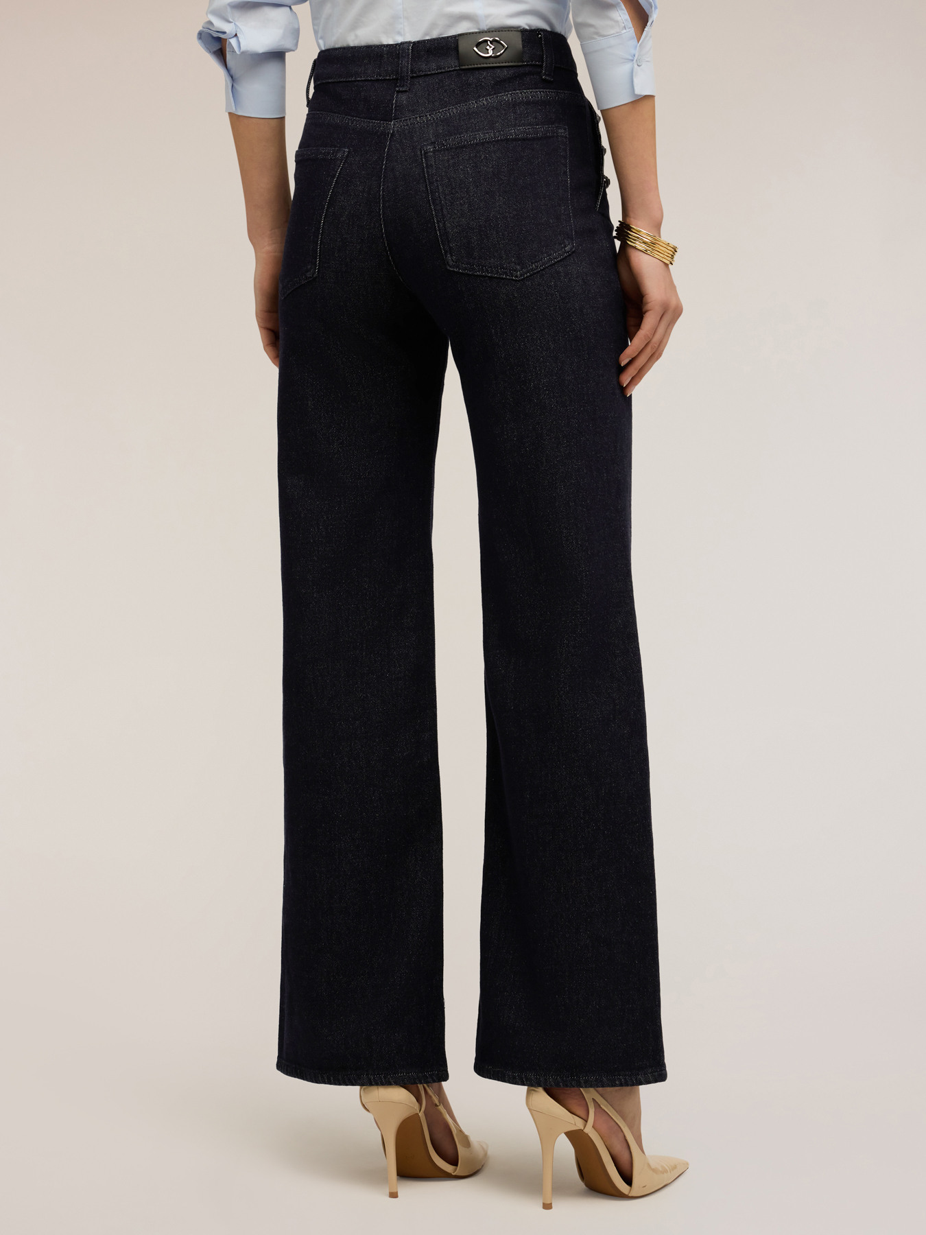 Jeans palazzo con bottoni decorativi image number 1