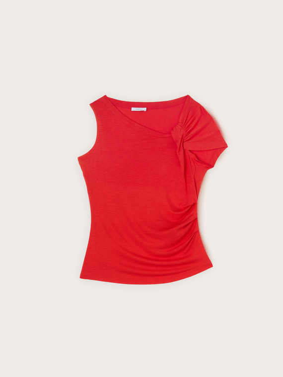 Top asimmetrico con drappeggio