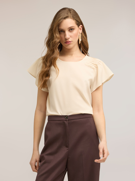 Blusa in cr&ecirc;pe de chine con pieghe